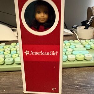 American Girl Doll mini Rebecca in Red and White Packaging with book.